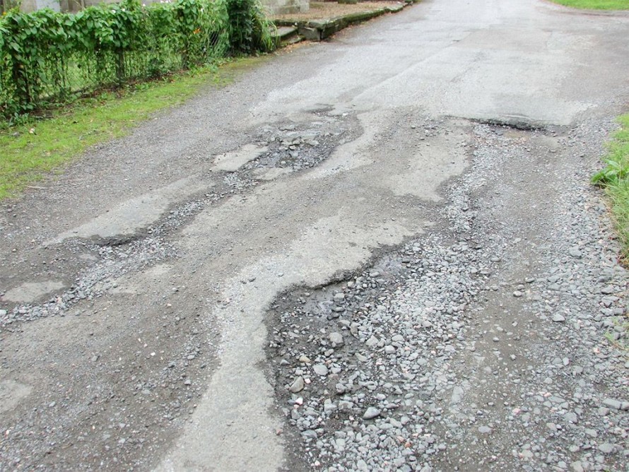 RAC Report Watch Out for Pot Holes