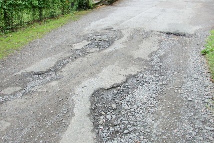 RAC Report Watch Out for Pot Holes